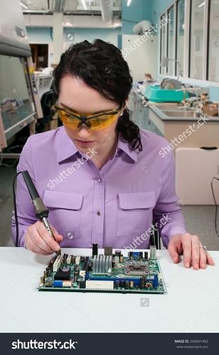 stock-photo-beautiful-woman-repair-soldering-a-printed-circuit-board-204001492-620x1004
